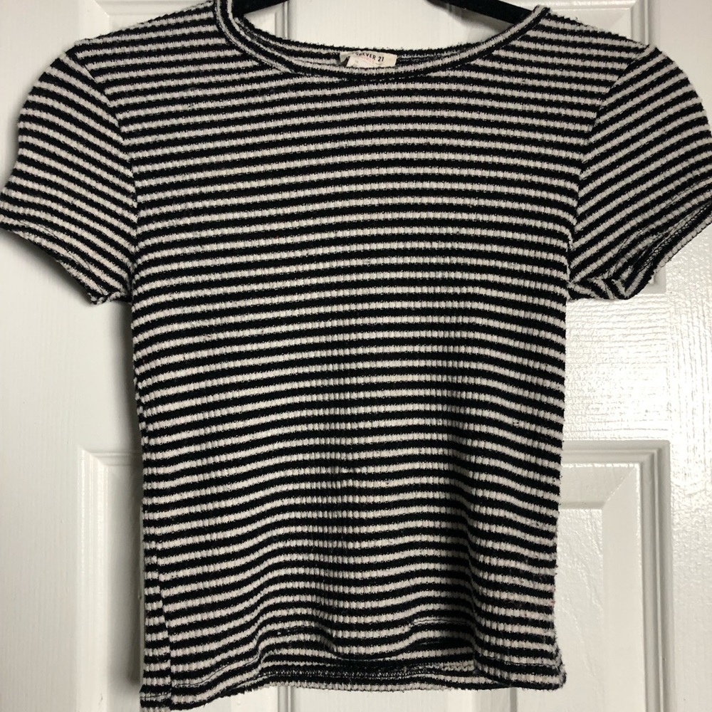 black and white, stretchy tshirt from forever 21, no tears, no loose stitching.